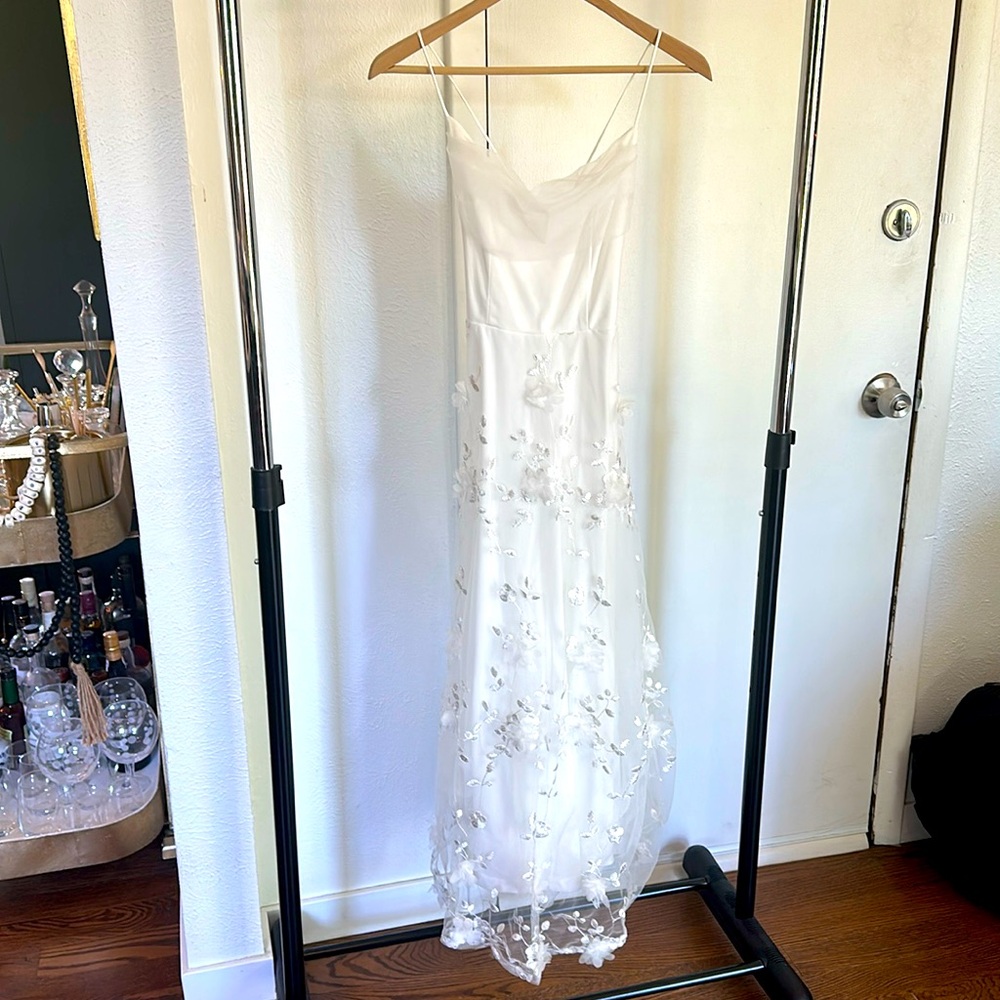 White dress with floral details
